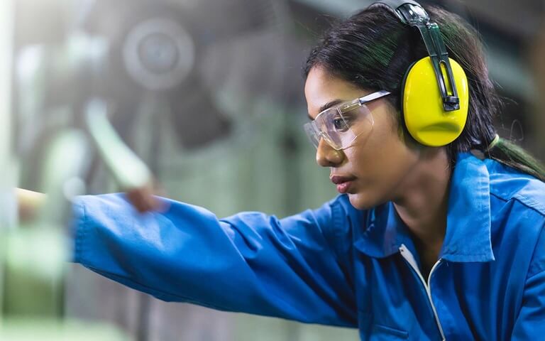 Woman with ear coverings on